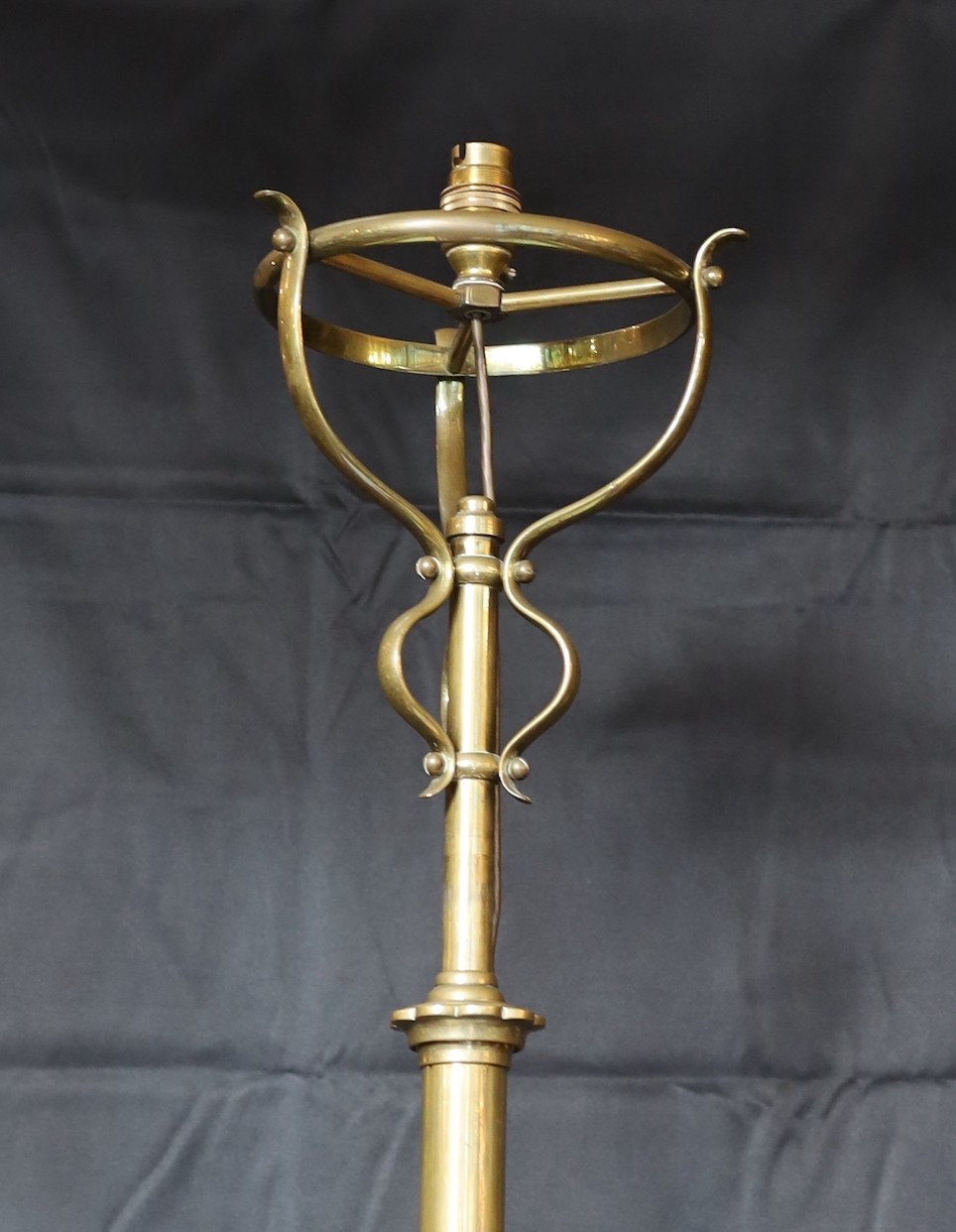 A late 19th century English telescopic lamp standard of Art Nouveau influence, converted from oil to electricity, heigh 149cm. width of base 49cm.